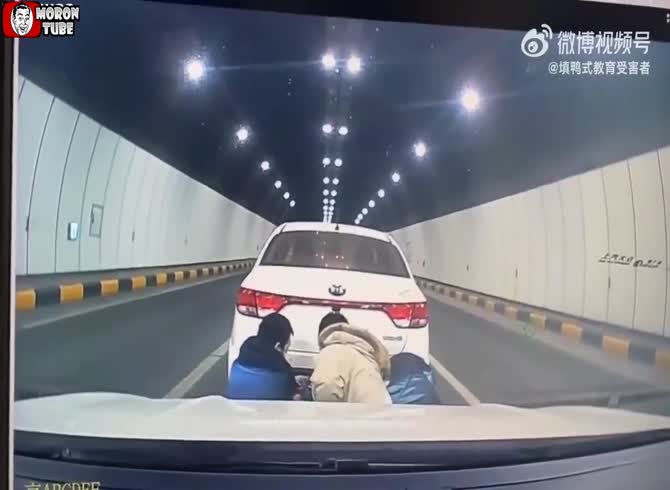Video :It's not a good idea to change your license plate while driving